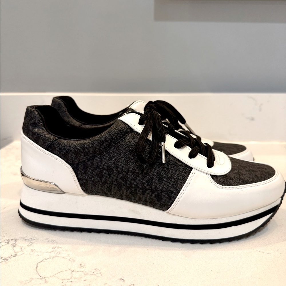 Black and white Michael Kors sneakers